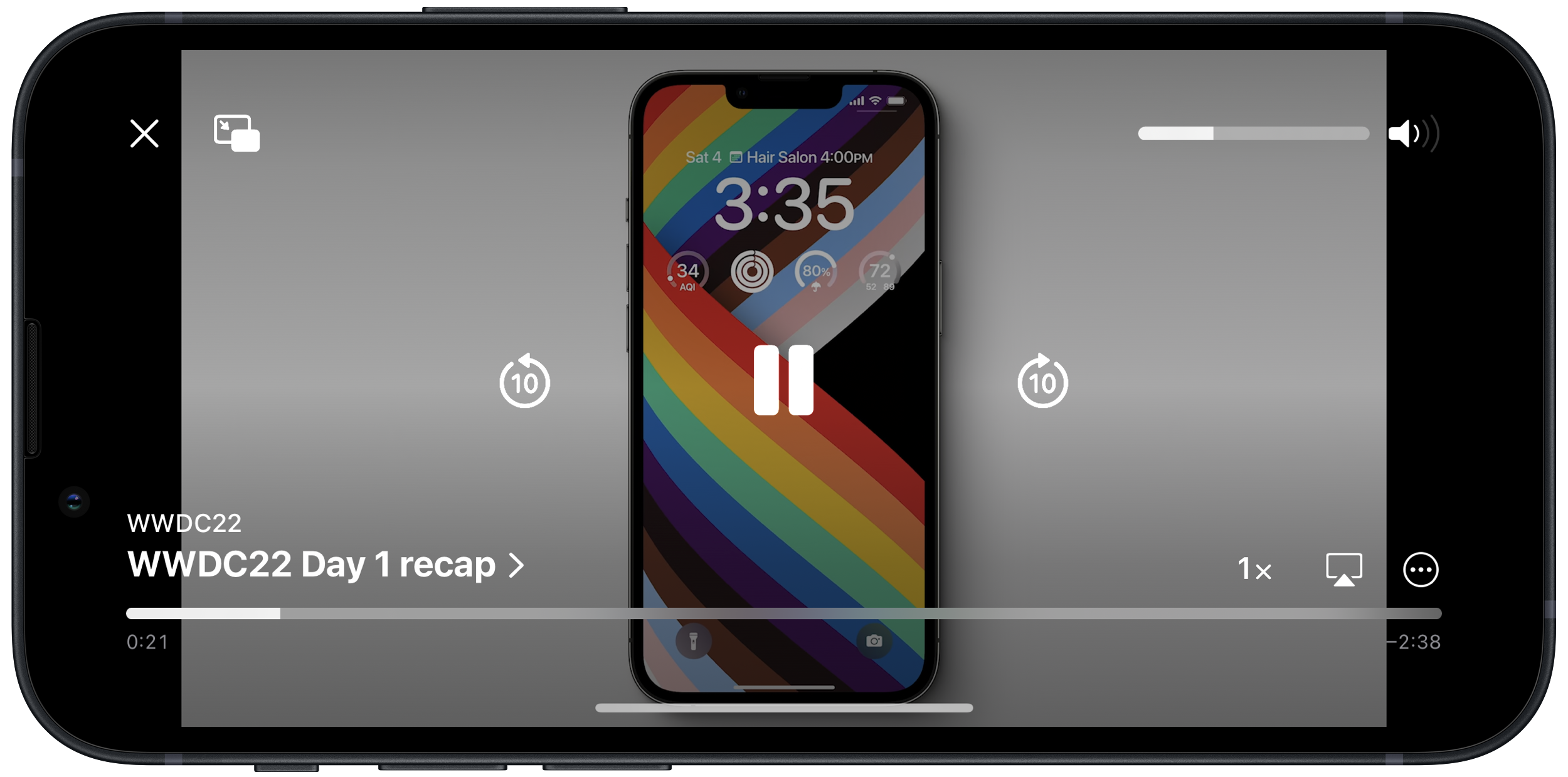 iOS 16 beta 3 lock screen with a video playing and showing the media player controls in landscape orientation